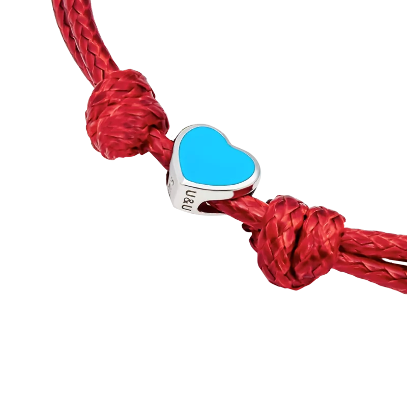 Браслет на шнурку Україна з серцем із блакитною емаллю фото