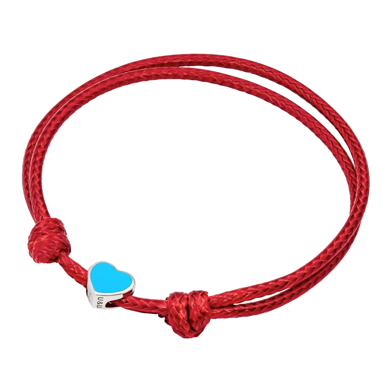 Браслет на шнурку Україна з серцем із блакитною емаллю фото