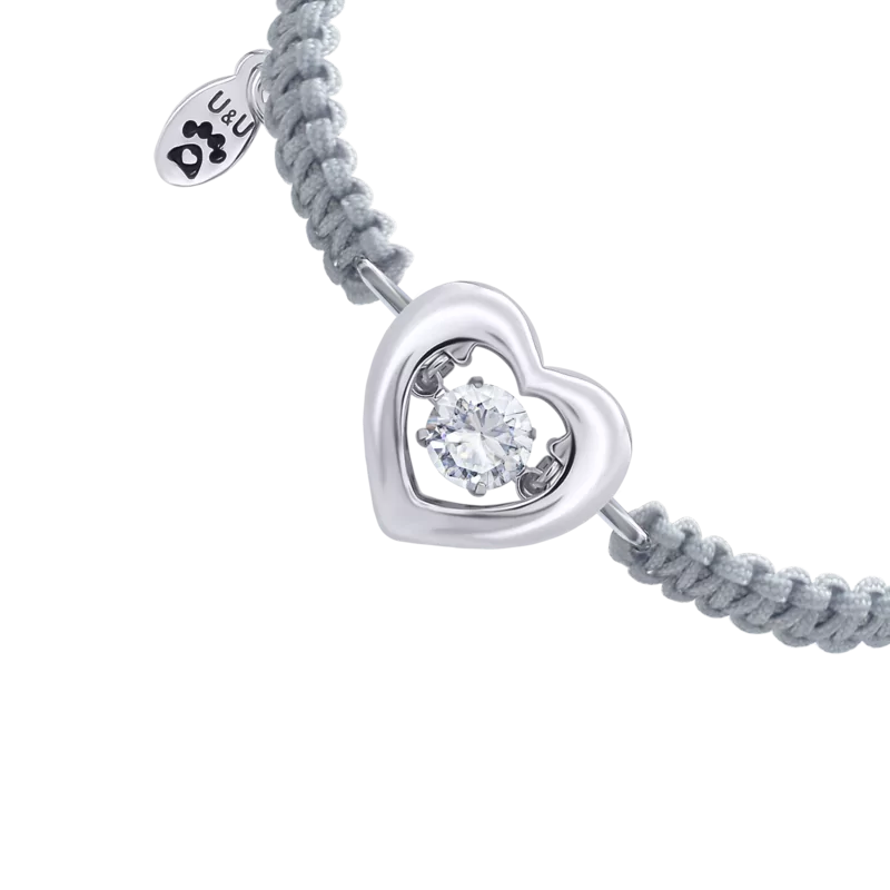 Braided bracelet Heart with a dancing stone photo